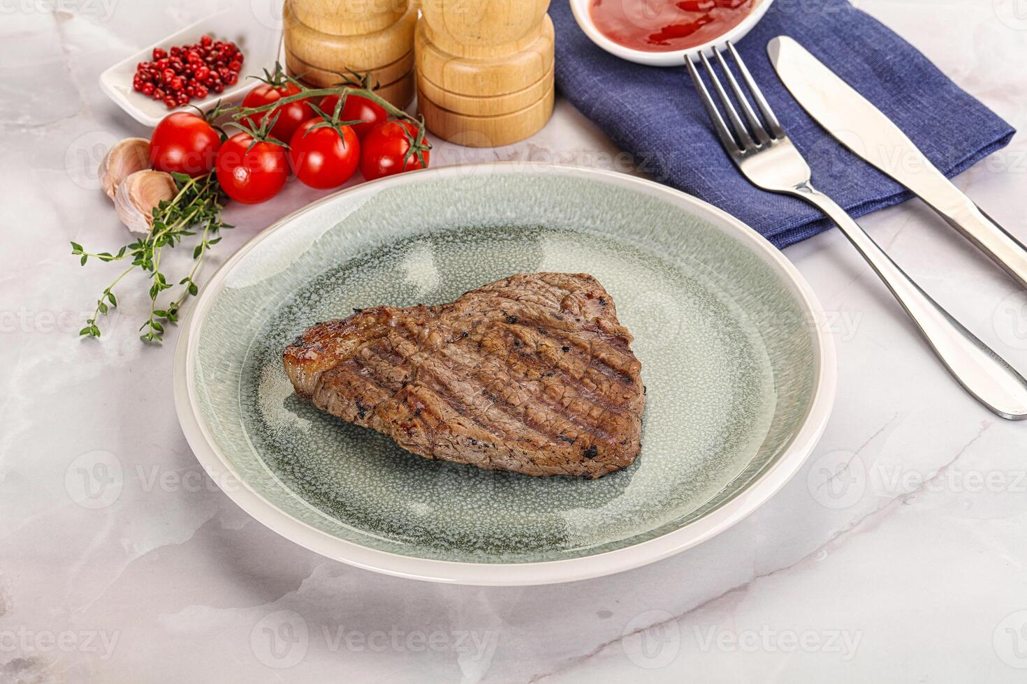 Grilled marble beef steak with sauce photo