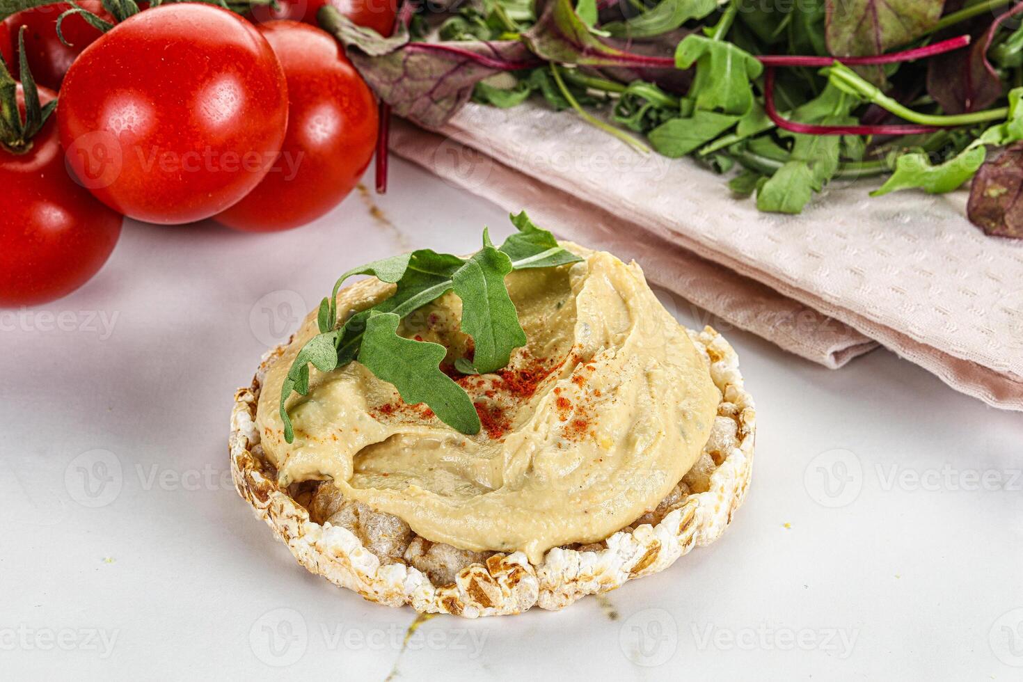 Crispbread with arabic creamy hummus photo