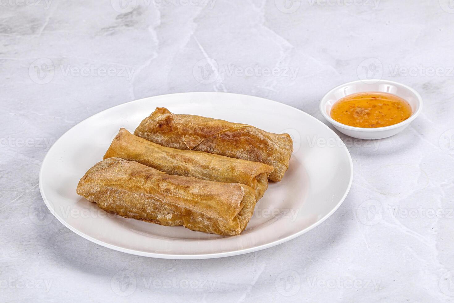 Traditional crispy fried stuffed springroll photo