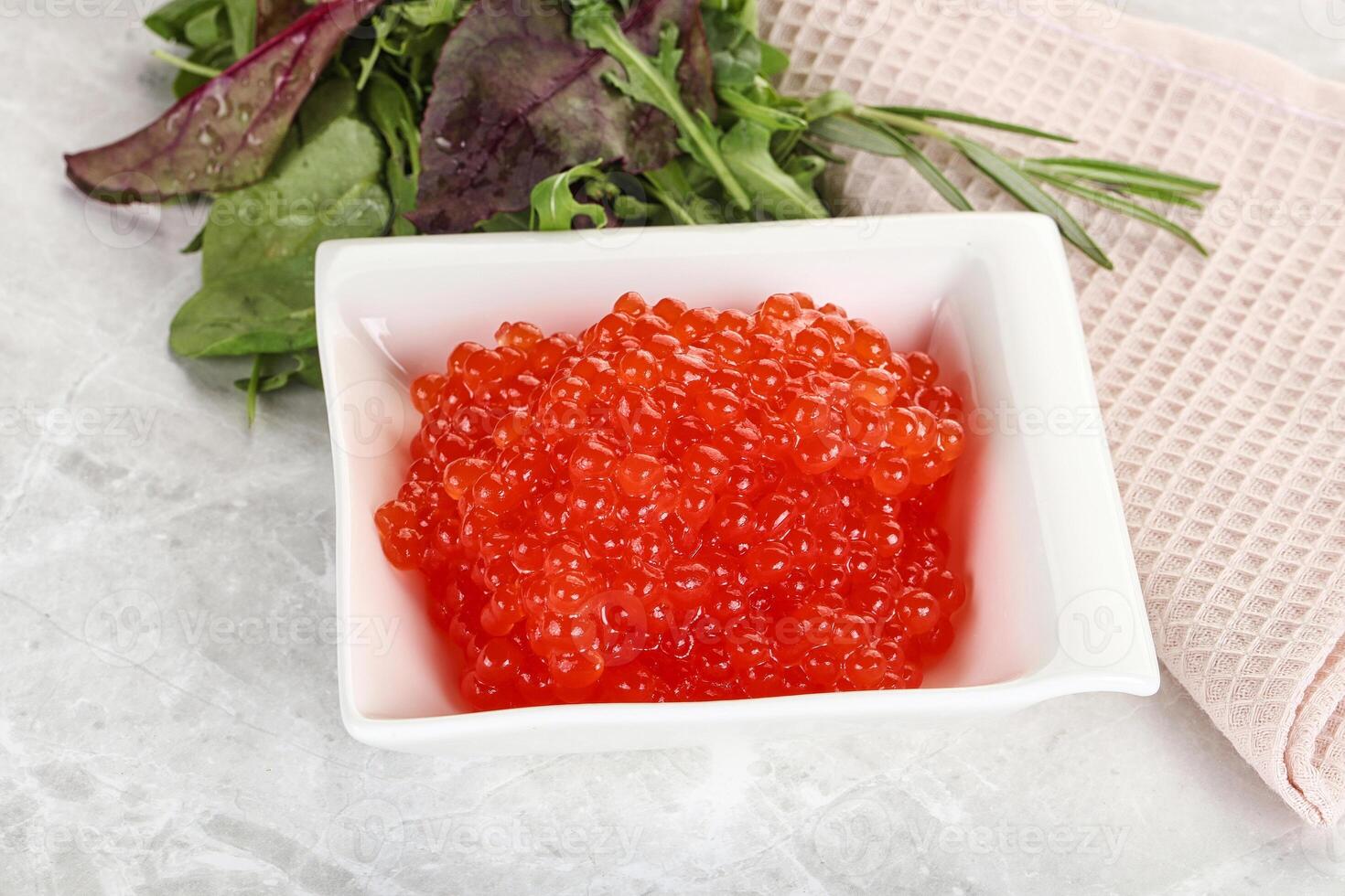 Red caviar in the bowl photo