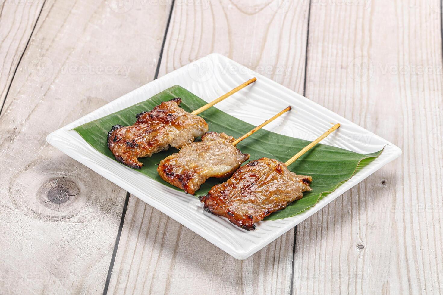 Thai cuisine - grilled pork skewer photo