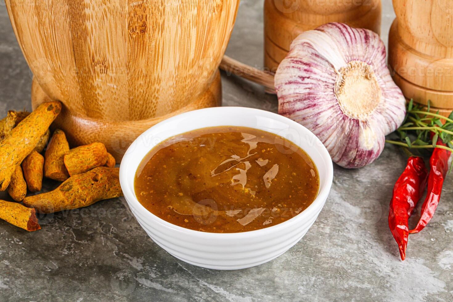 Indian curry sauce in the bowl photo