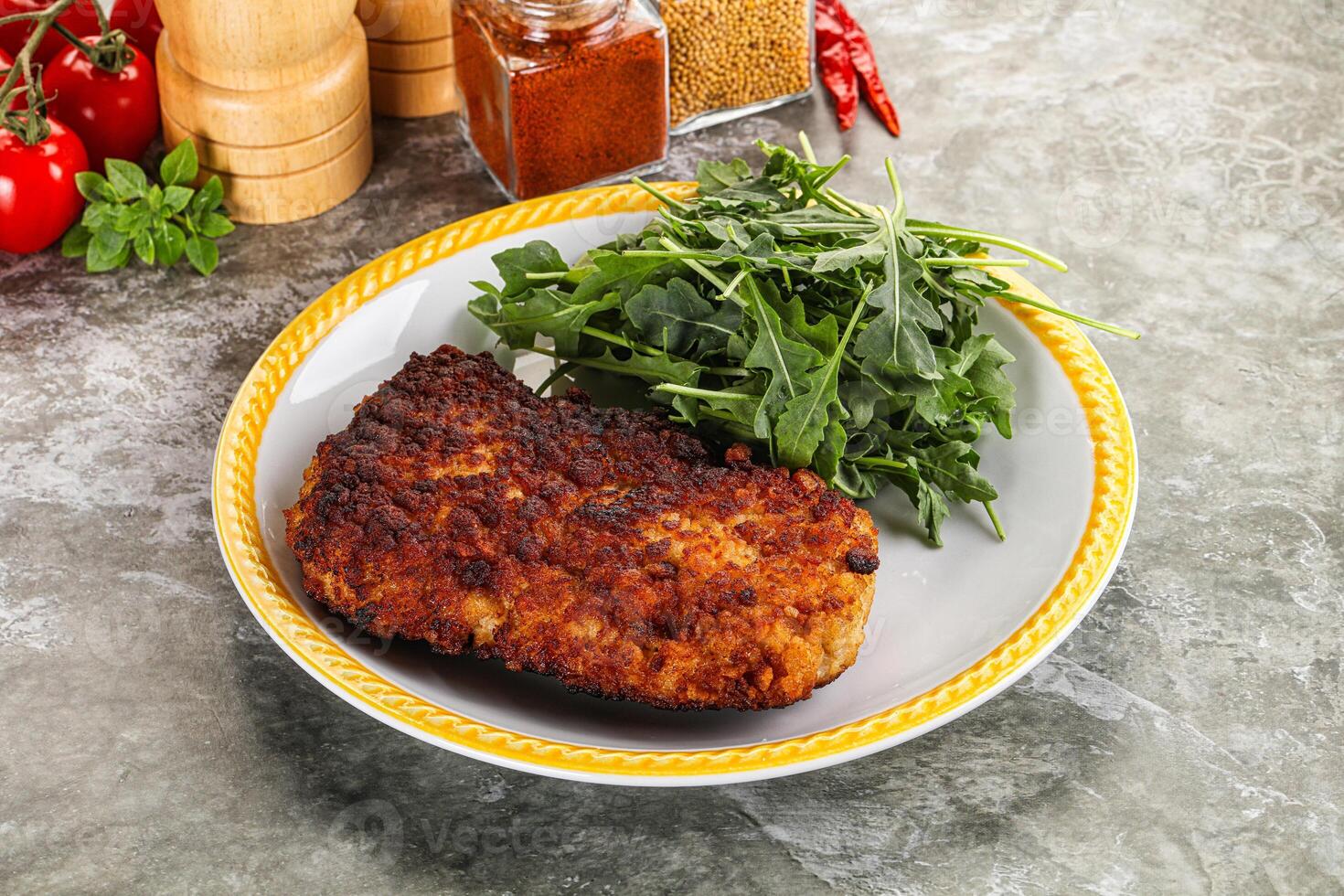 Tasty roasted breaded meat schnitzel photo