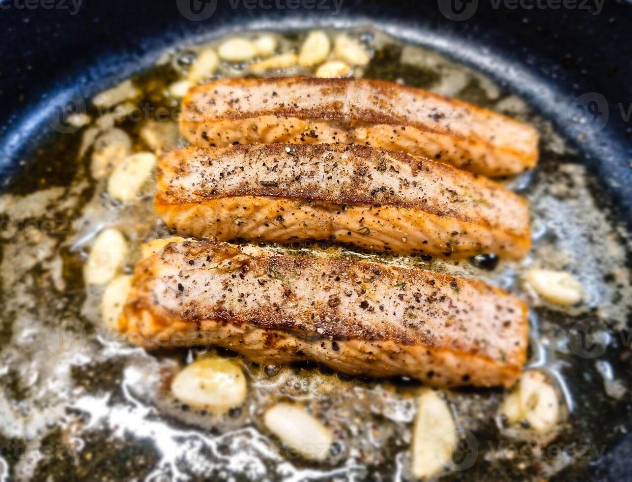 Fresh Salmon filet with herbs and spices photo