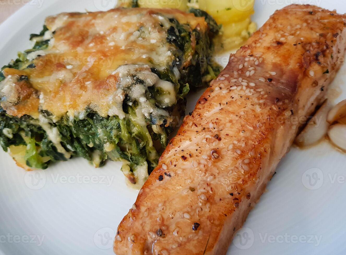 Fresh Salmon filet with herbs and spices photo