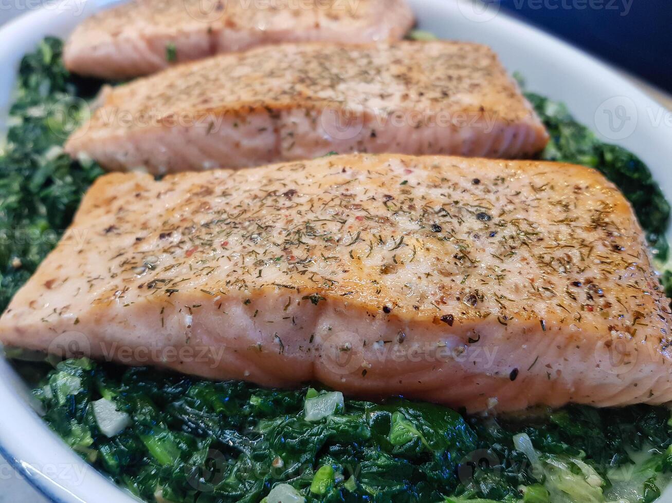 Fresh Salmon filet with herbs and spices photo