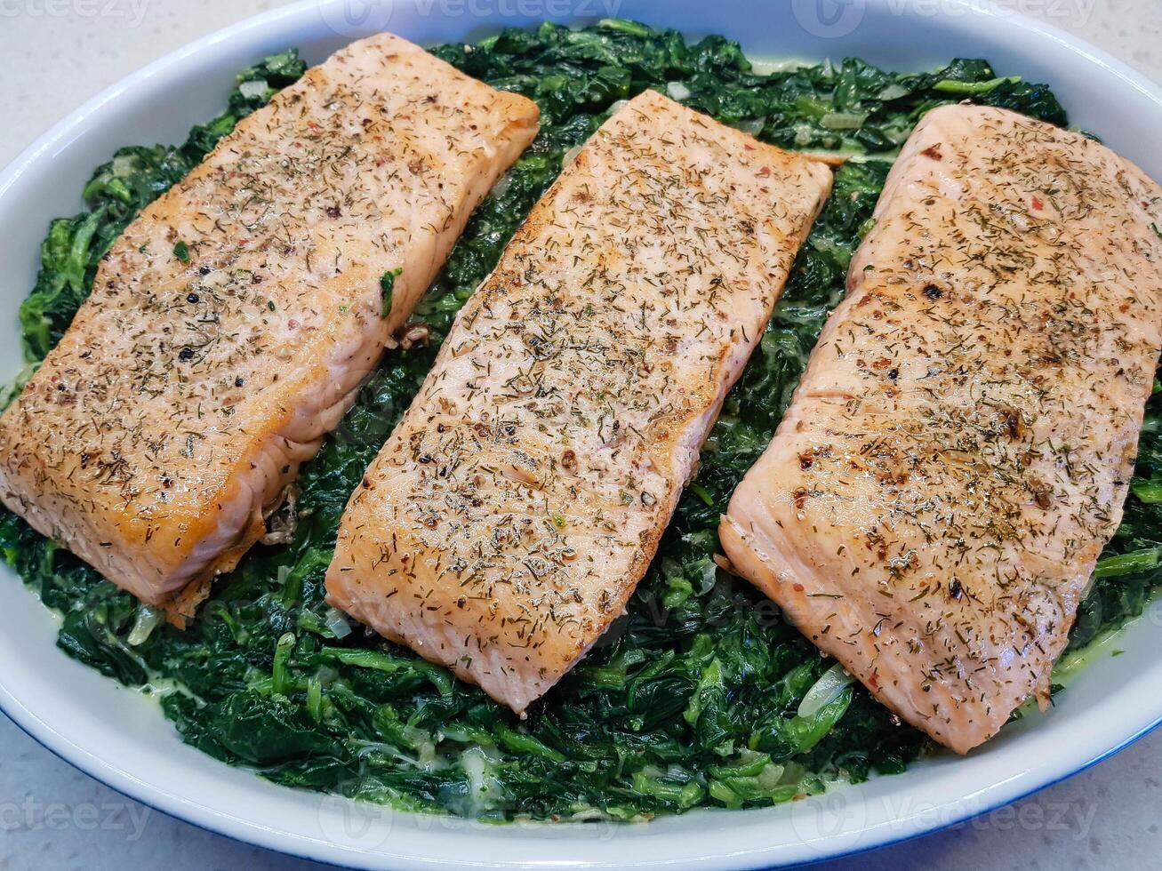 Fresh Salmon filet with herbs and spices photo