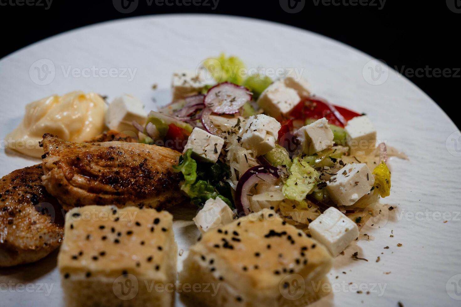 fresh chicken with herbs and spices photo