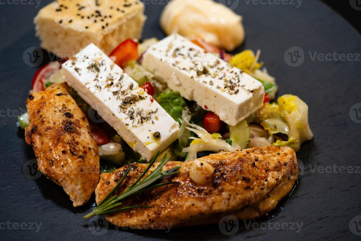 fresh chicken with herbs and spices photo