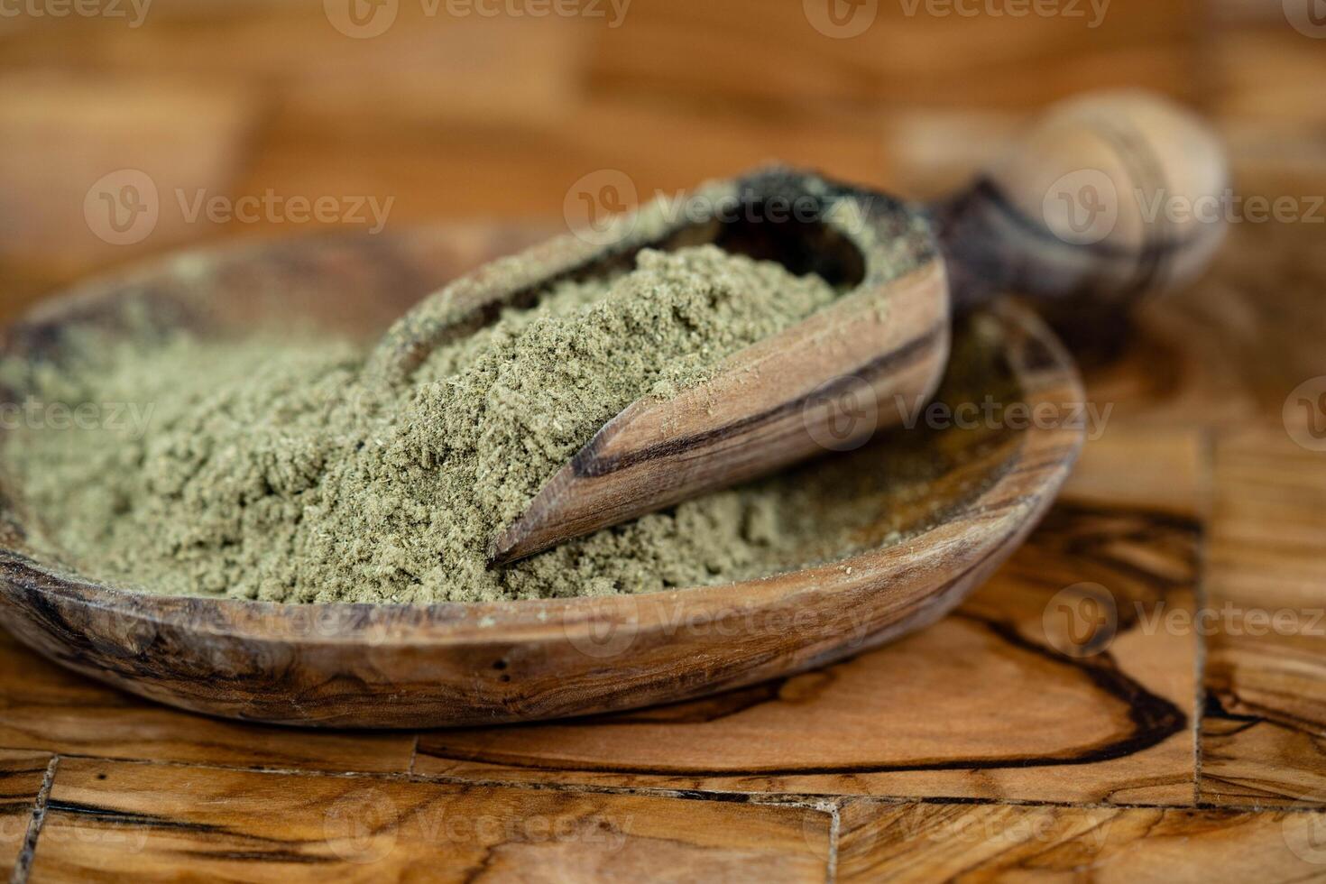 Sage leaves on olive wood photo