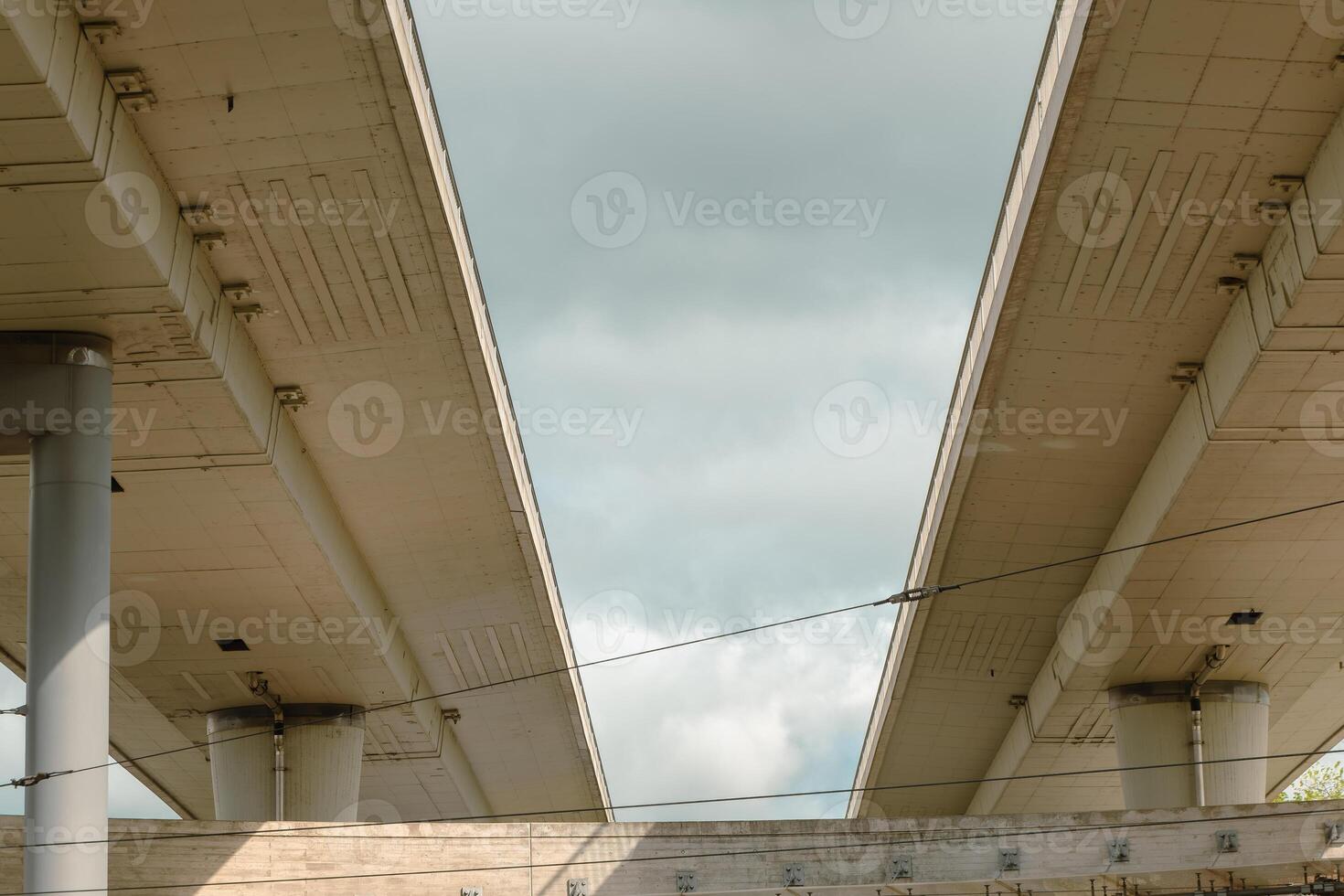 a highway bridge with a view from below photo