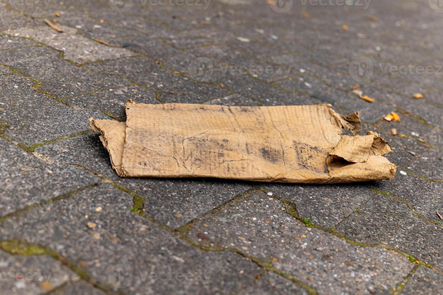 cardboard waste in the city on a footpath photo