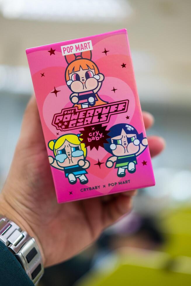 Bangkok, Thailand - April 26, 2024 CRYBABY Powerpuff Girls Series Figures in pink box from Pop mart shop photo