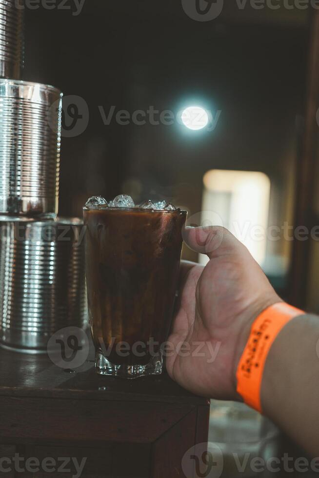 Thai coffee with ice in a glass photo