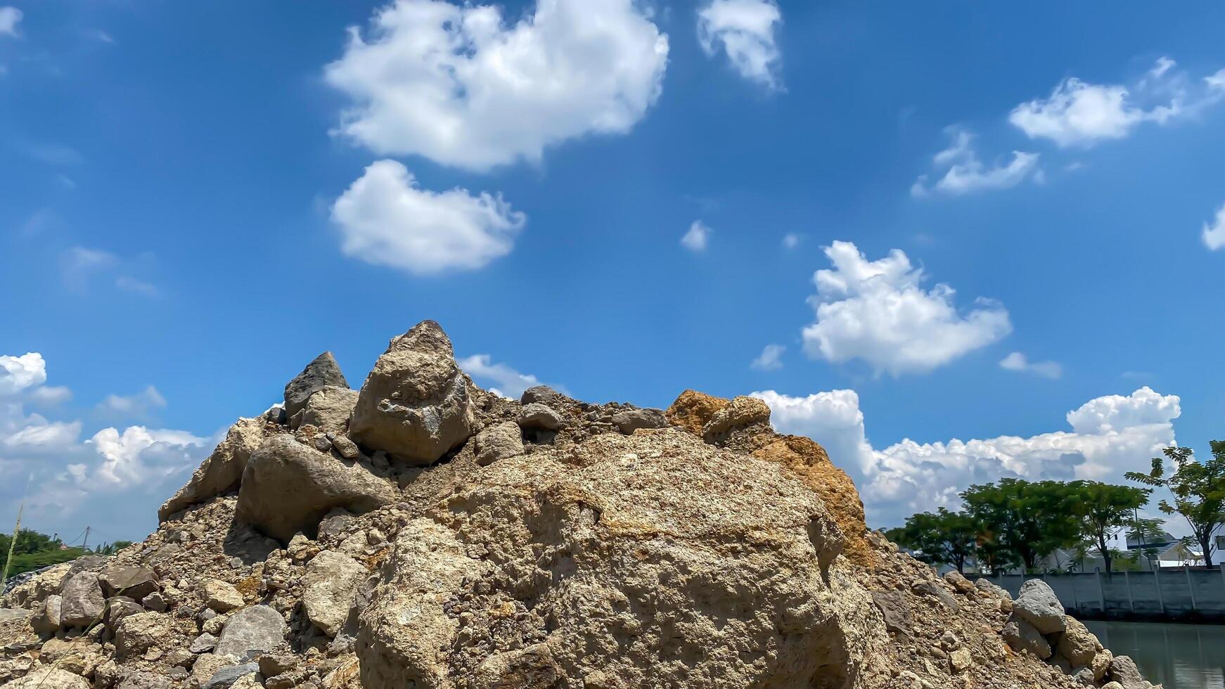 rocks in the mountains with landscapes of sky photo