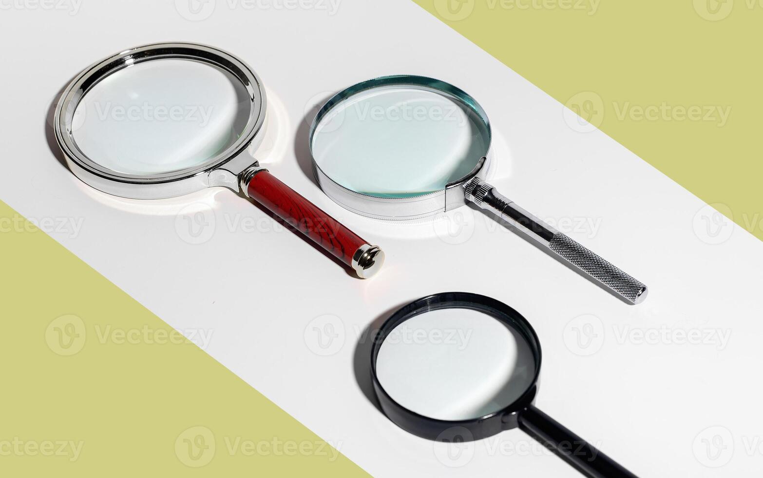 Glass magnifier concept. Science object with handle for scrutiny. Minimal explore background. photo