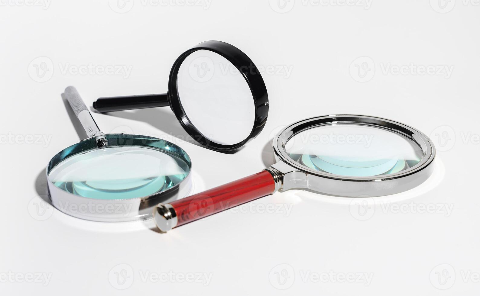 Glass magnifies threefold. Loupe zooms background, transparent lens. Study science concept, photo