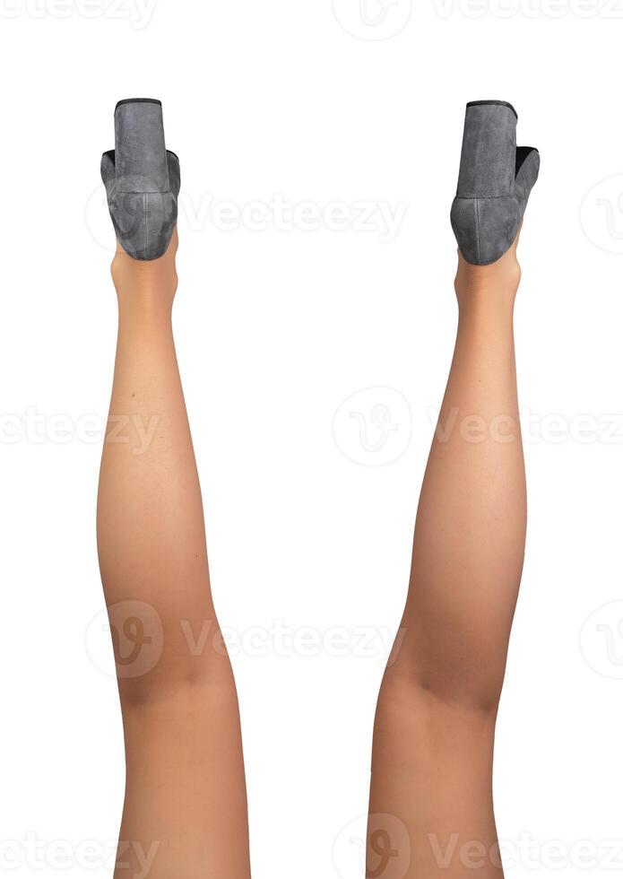 Women legs raised up, funny pose, gray heeled shoes, back, behind view, isolated on white photo