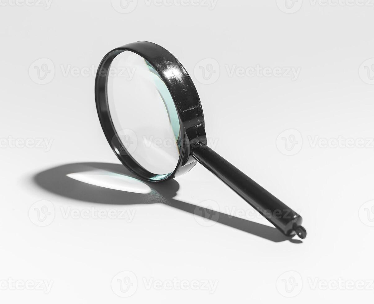 Glass magnifies, lens zooms. Loupe concept for science, focus on object. Transparent aim, curiosity photo