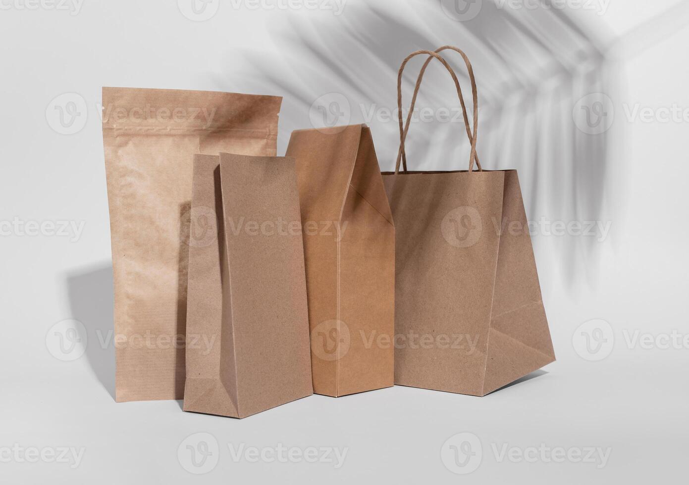 Kraft paper bag, pouch, sack, box. Brown beige eco package, packs for product, gifts photo