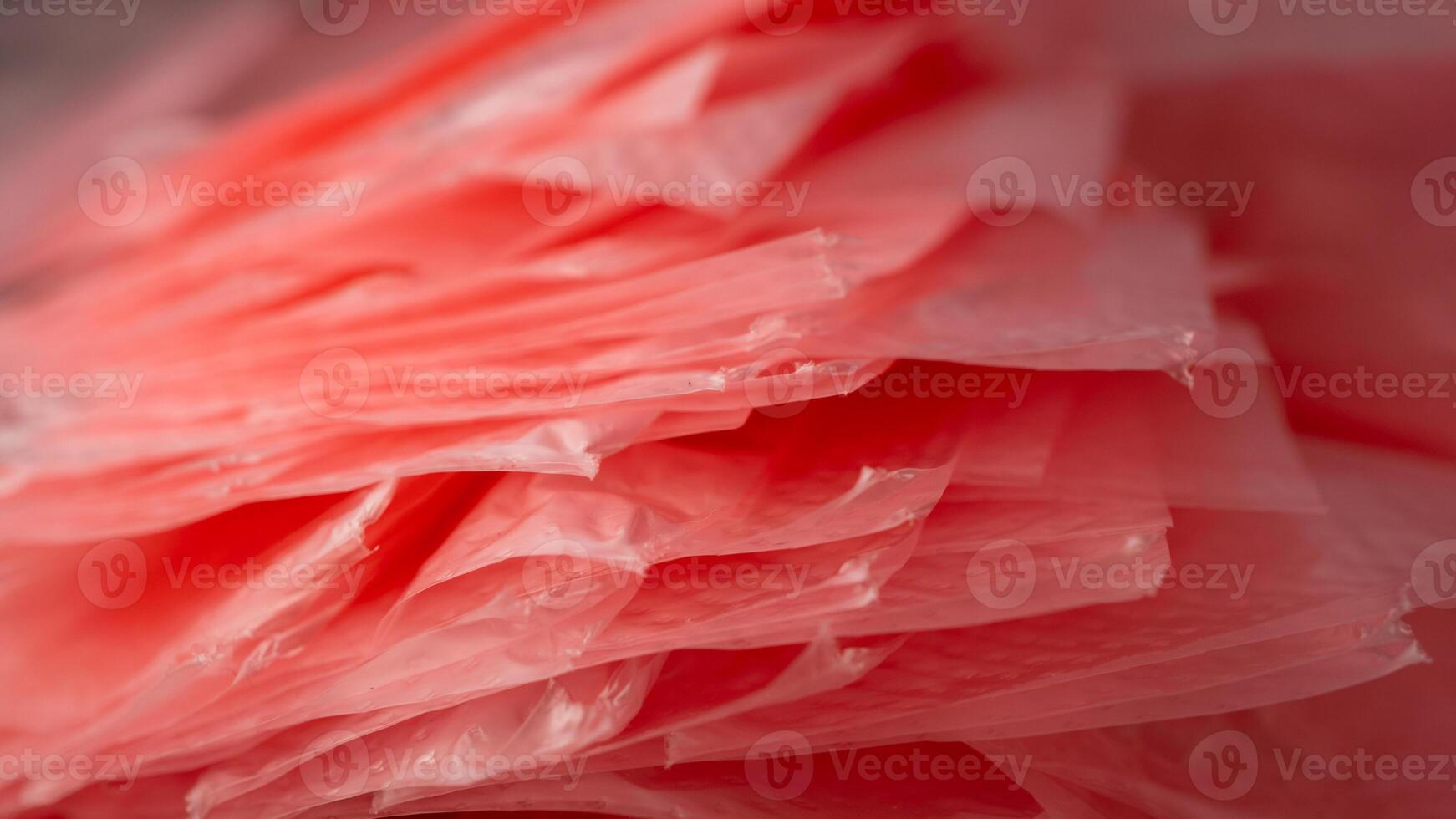 Macro shot on a pack of plastic bags. Concept of microplastics and water pollution. Polyethylene disposable plastic grocery bags photo