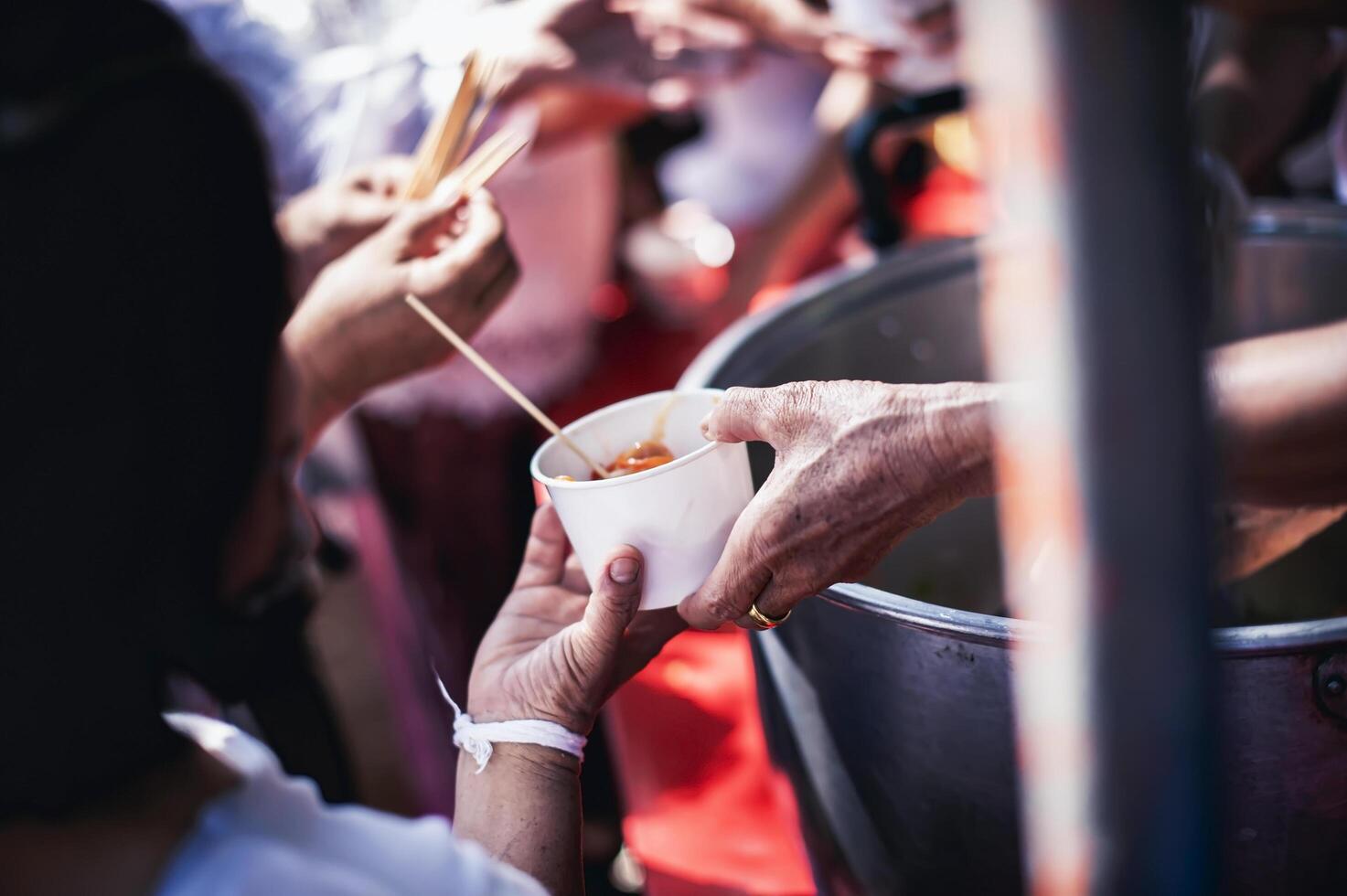 The concept of sharing. Participation in sharing food for the poor photo