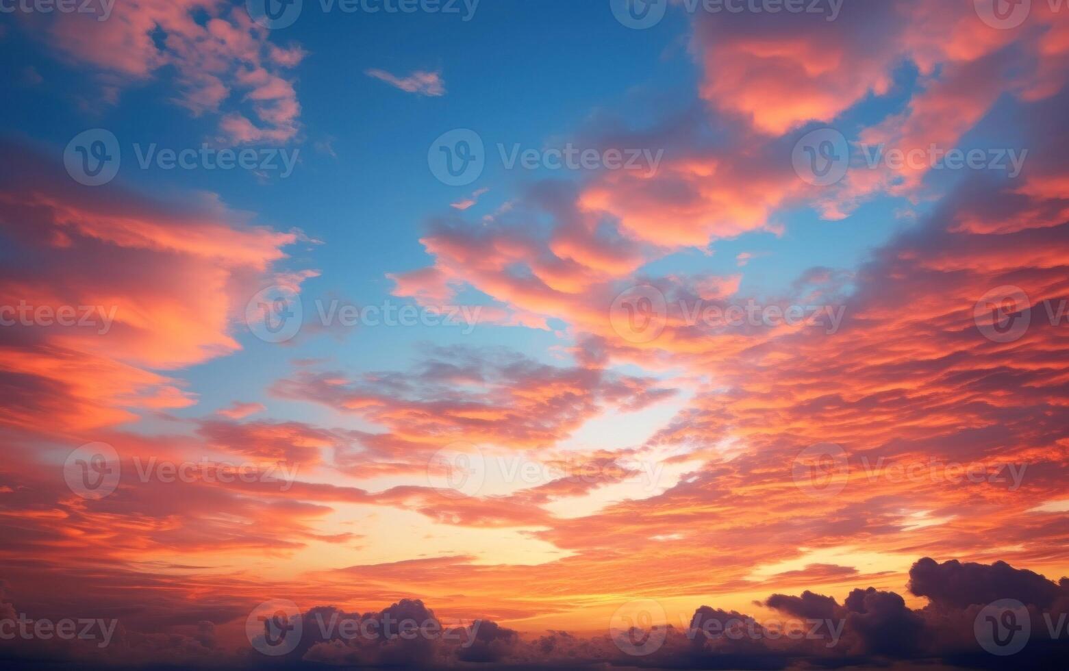 Majestic sky panorama showcasing both sunset and sunrise against a backdrop of clouds photo