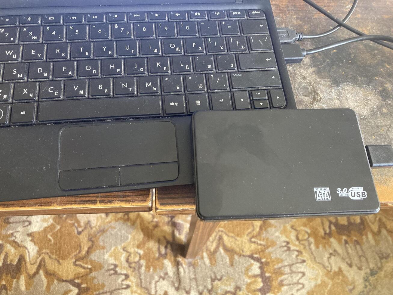 KYIV, UKRAINE - April 12, 2024 Hard drive for storing laptop information photo