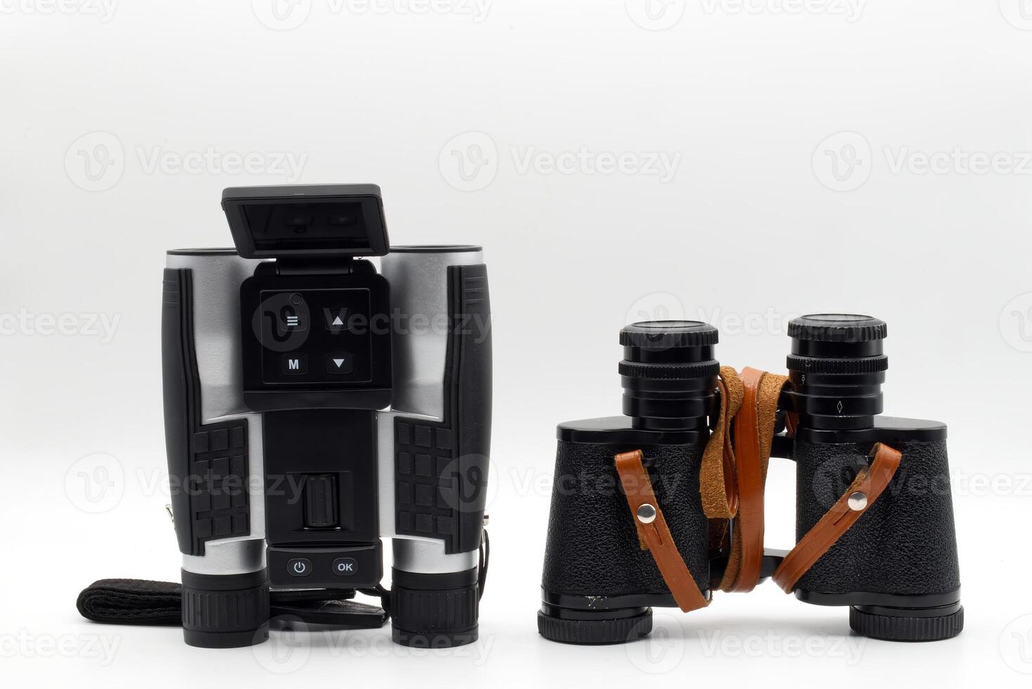 Modern binoculars with digital screen and vintage binoculars. Vintage binoculars Vs modern binoculars. photo