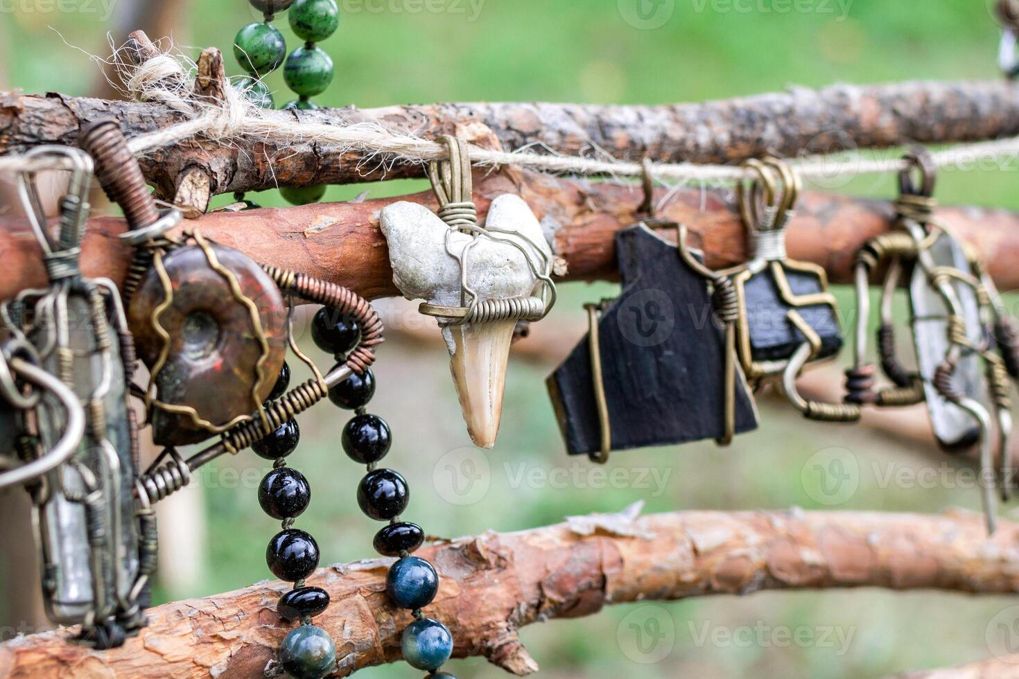 Handmade craft jewelry from metal and natural stones. Handcraft precious item. Jewelry accessories. photo