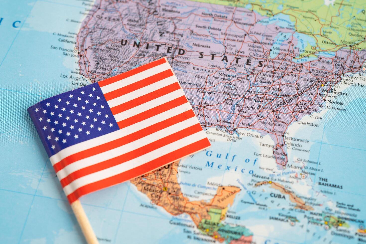 Bangkok, Thailand December 7, 2023, USA America flag on world map background. photo