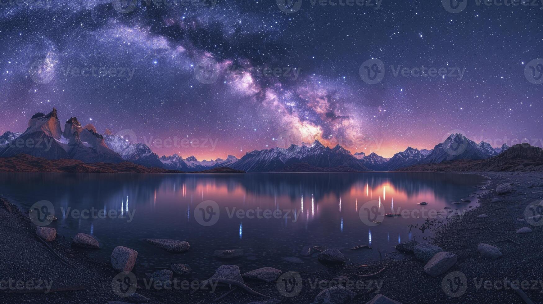 The Milky Way Illuminates the Sky, Revealing the Silhouettes of Beautiful Mountains and Rivers in a Serene and Majestic Landscape. photo