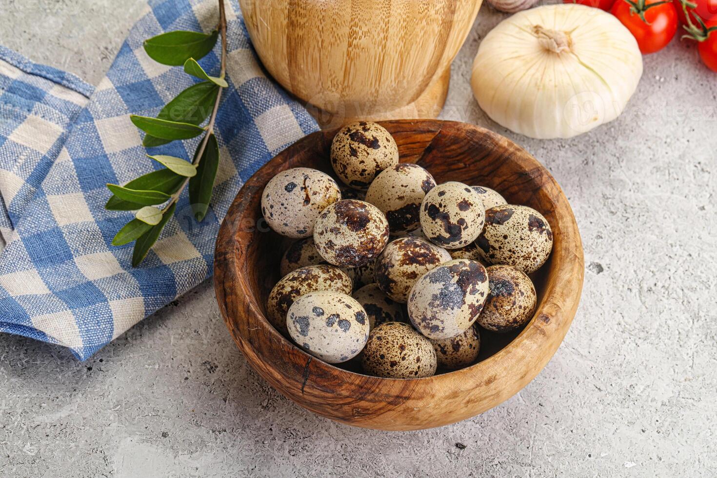 Raw quail eggs in the bowl photo