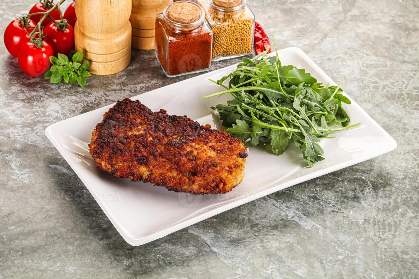 Tasty roasted breaded meat schnitzel photo