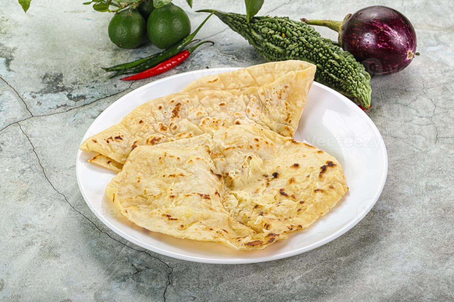 Indian tandori bread - naan with cheese photo