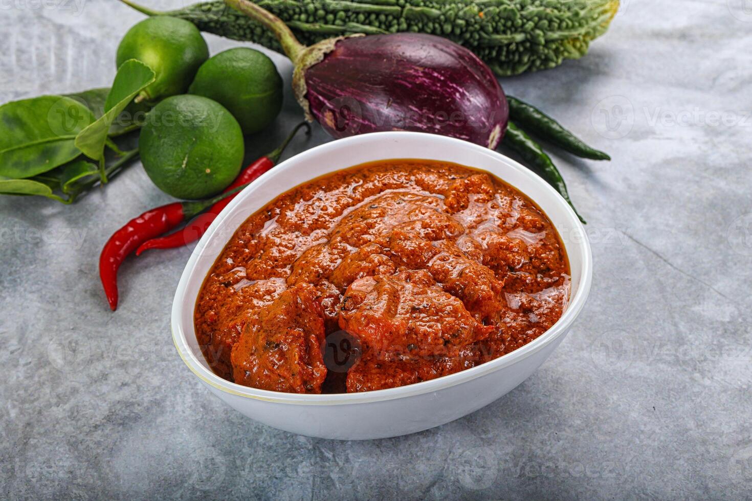 Indian cuisine - butter chicken with sauce photo