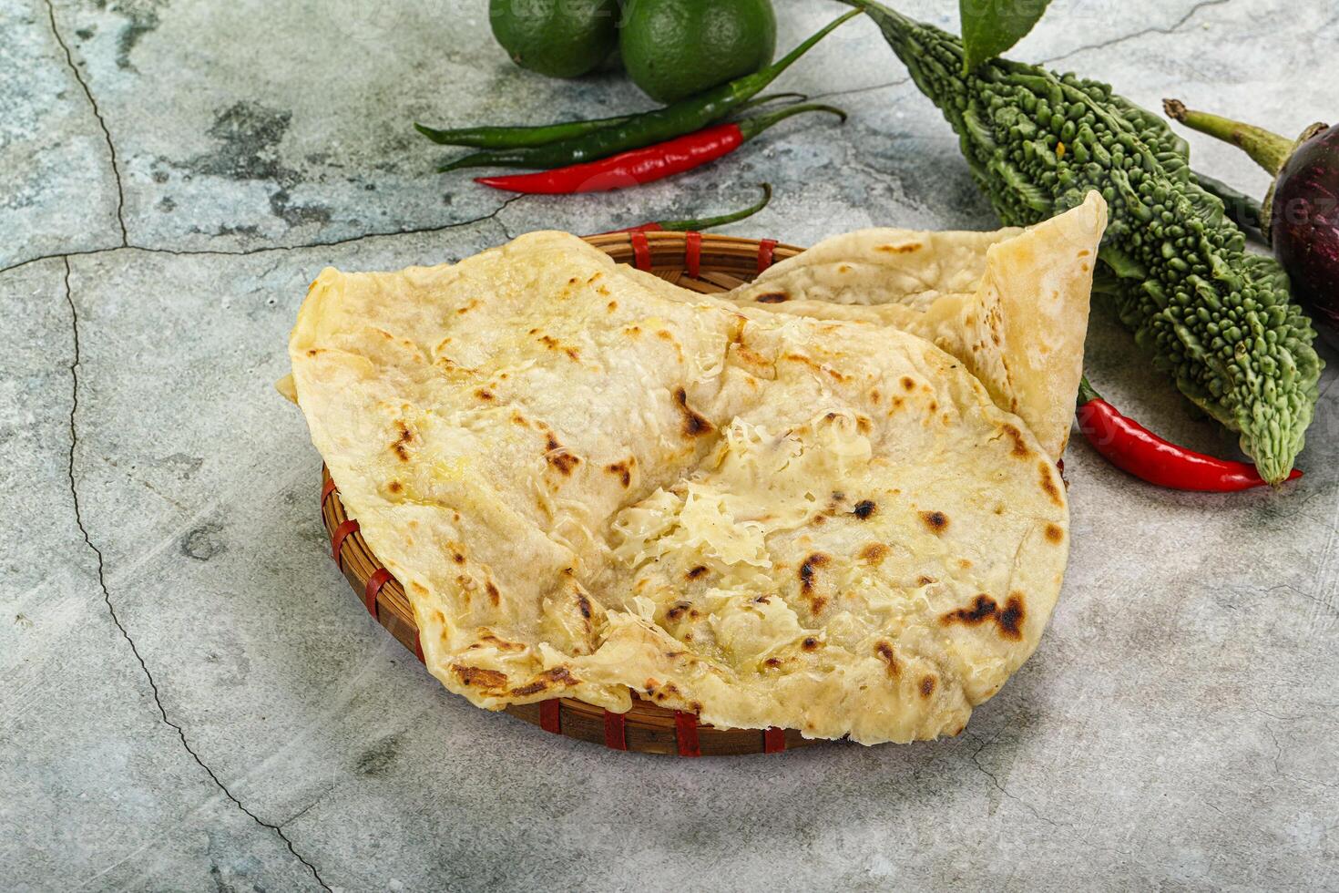 Indian tandori bread - naan with cheese photo