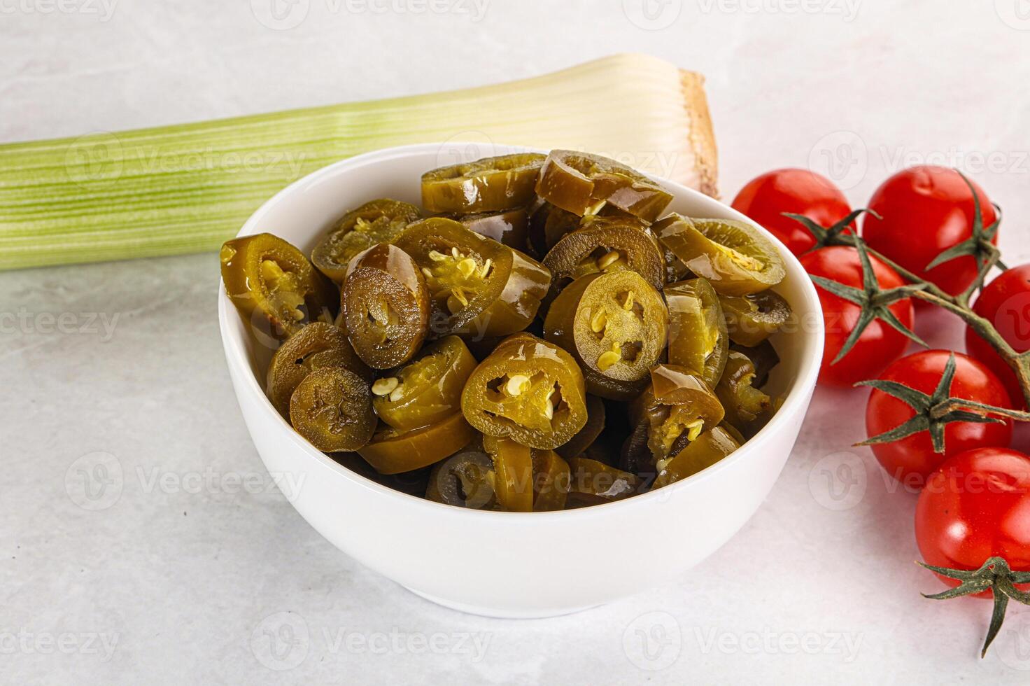 Sliced canned jalapeno pepper photo