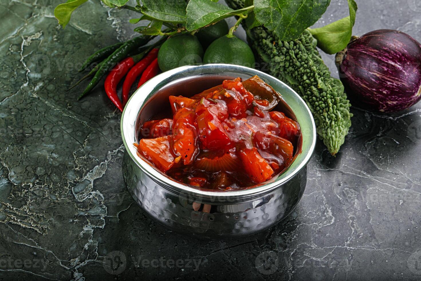 Chinese cuisine - chicken in sweet and sour sauce photo