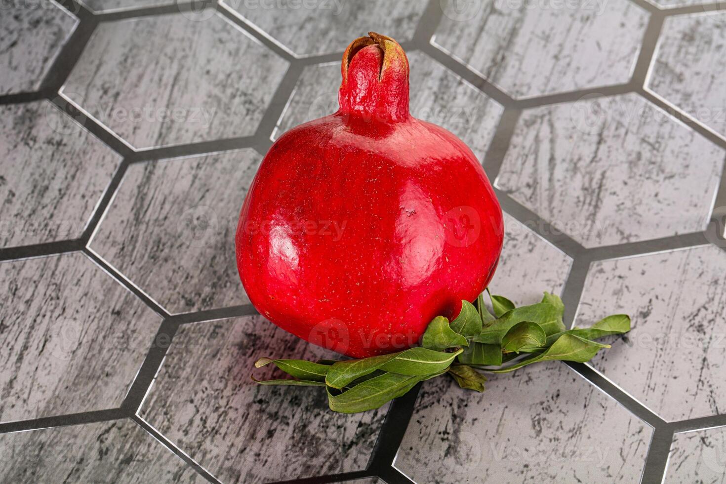 Ripe red sweet and juicy Pomegranate photo