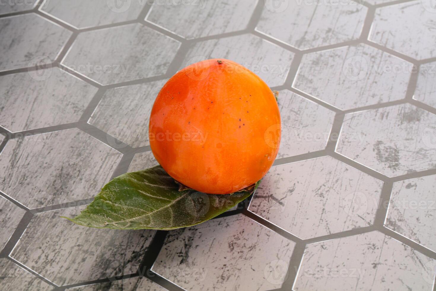 Fresh ripe sweet juicy persimmon photo