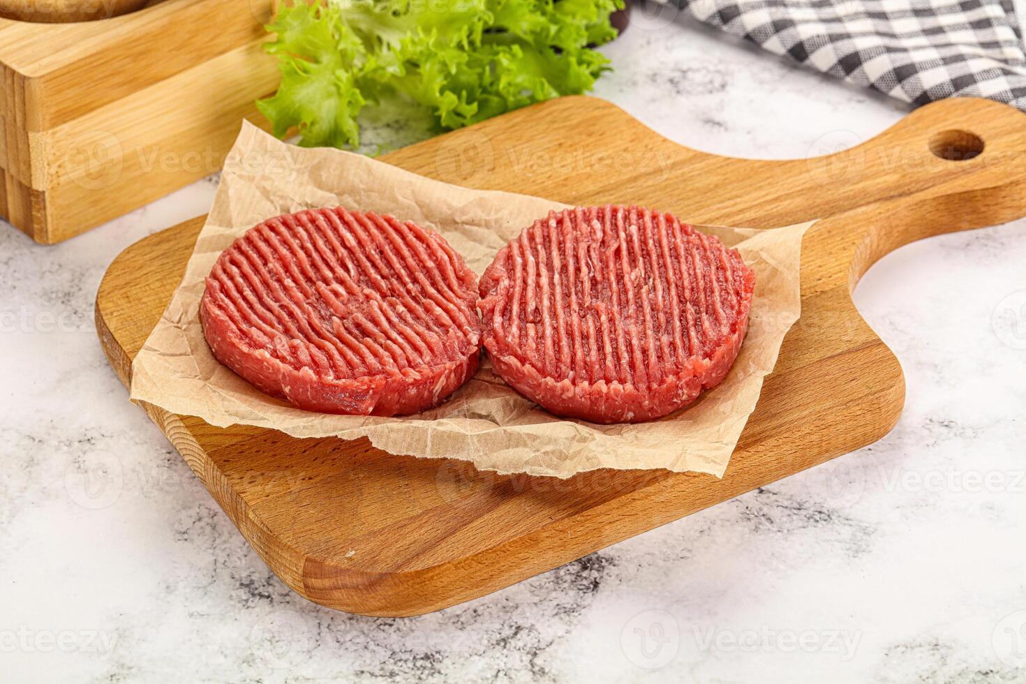 Raw beef burger cutlet for grill photo