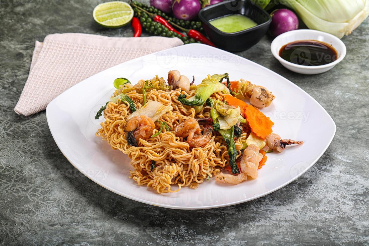 Asian cuisine - Fried noodles with seafood photo