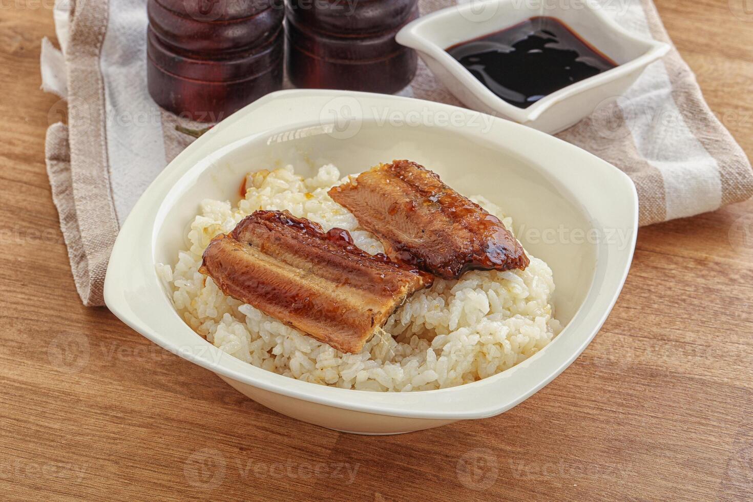 Roasred eel with steamed rice photo