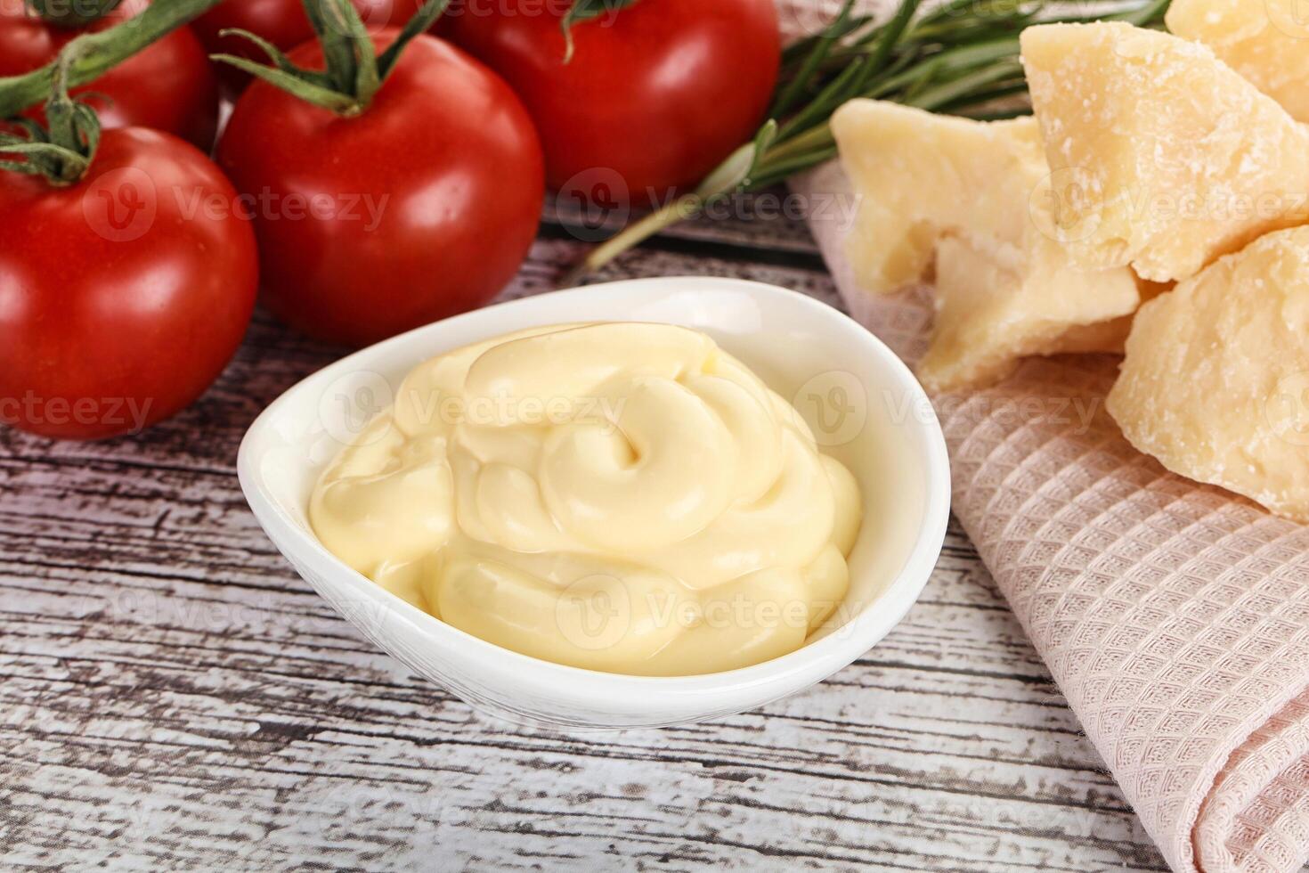 Cheese sauce in the bowl photo