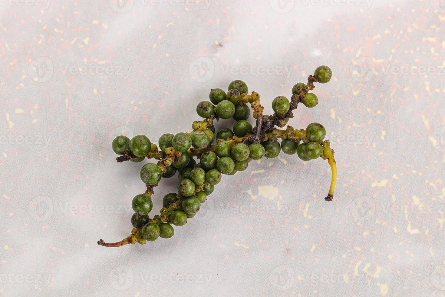 Green pepper corn heap isolated photo