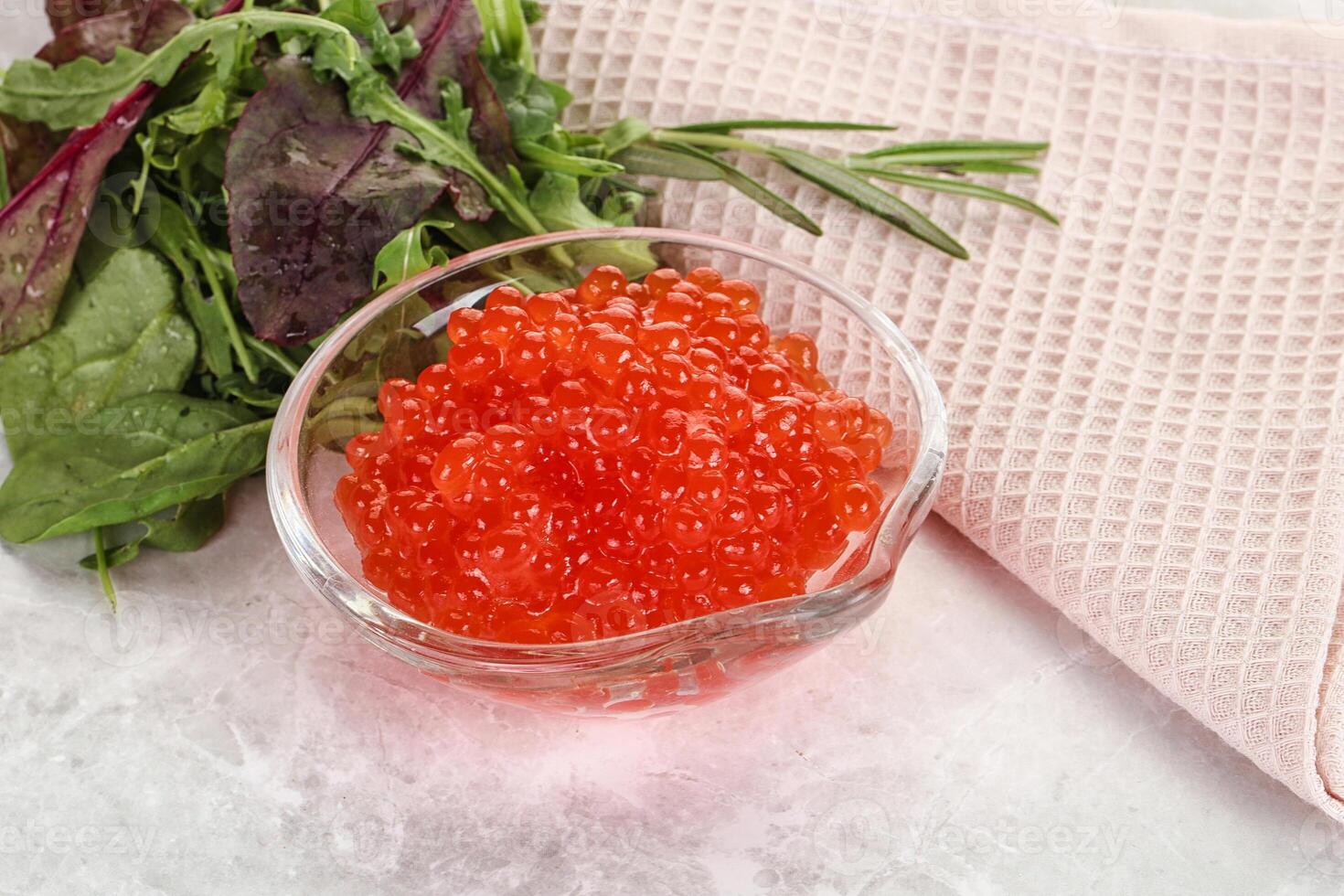 Red caviar in the bowl photo