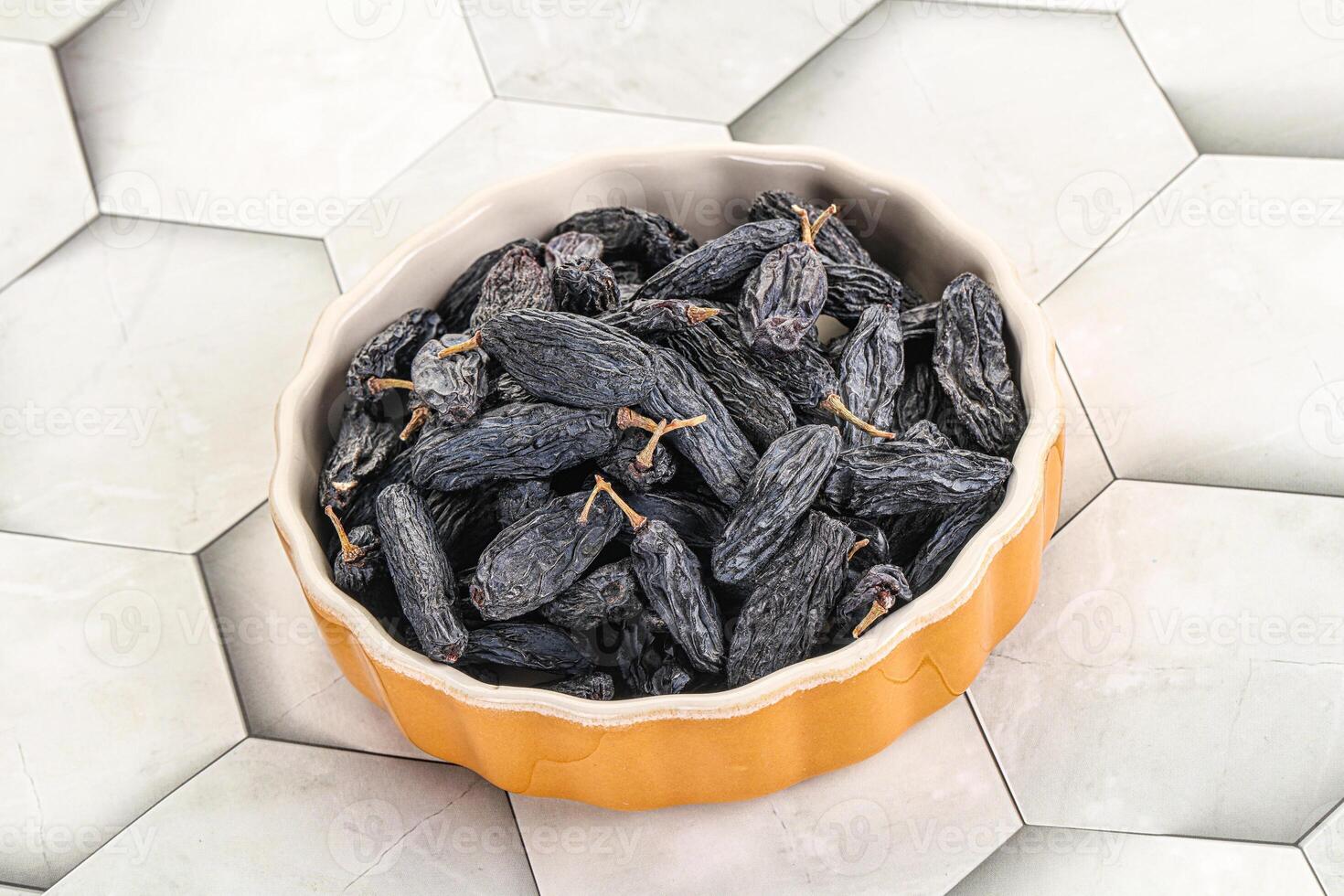 Blue raisin - dry grape berries photo