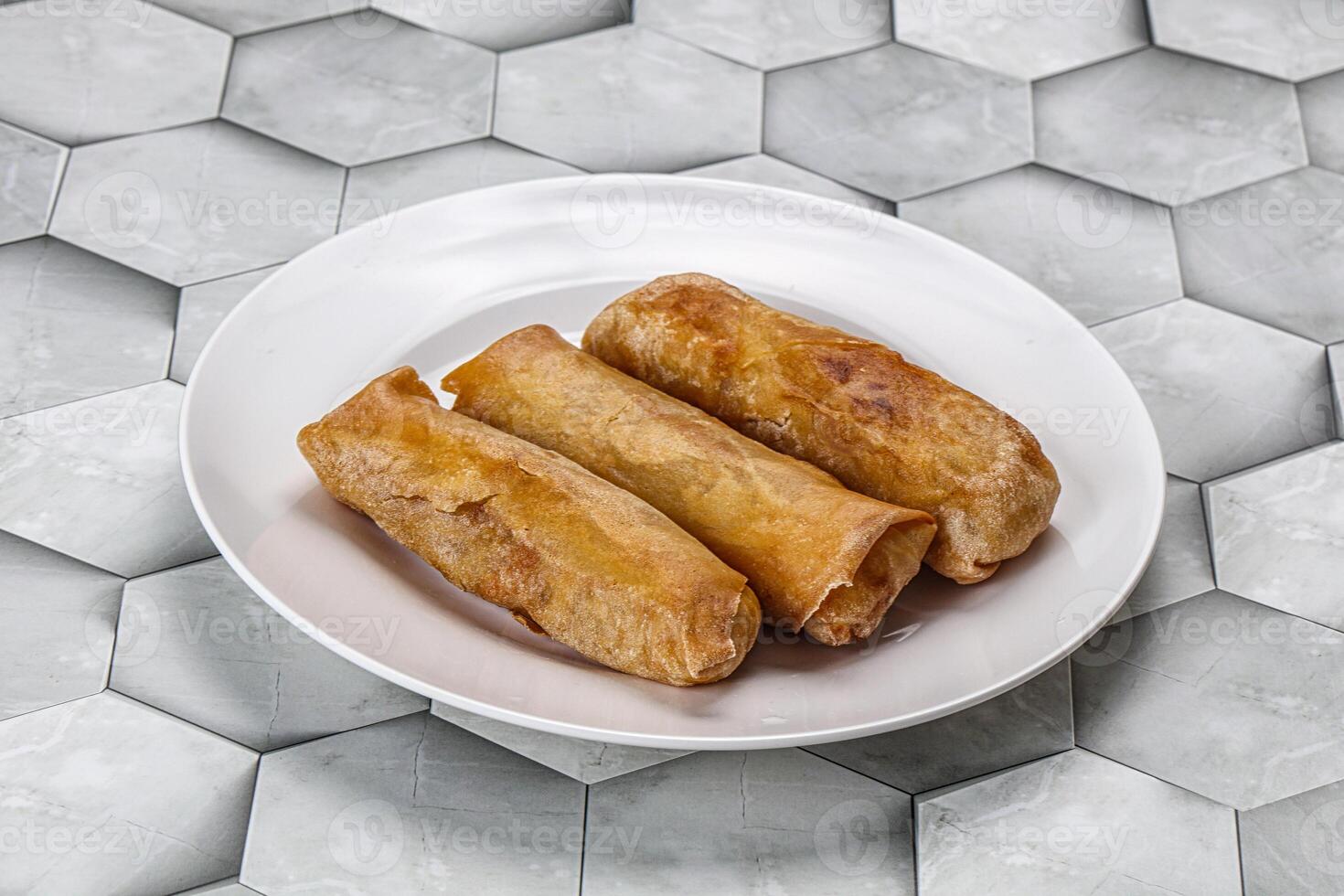 Traditional crispy fried stuffed springroll photo