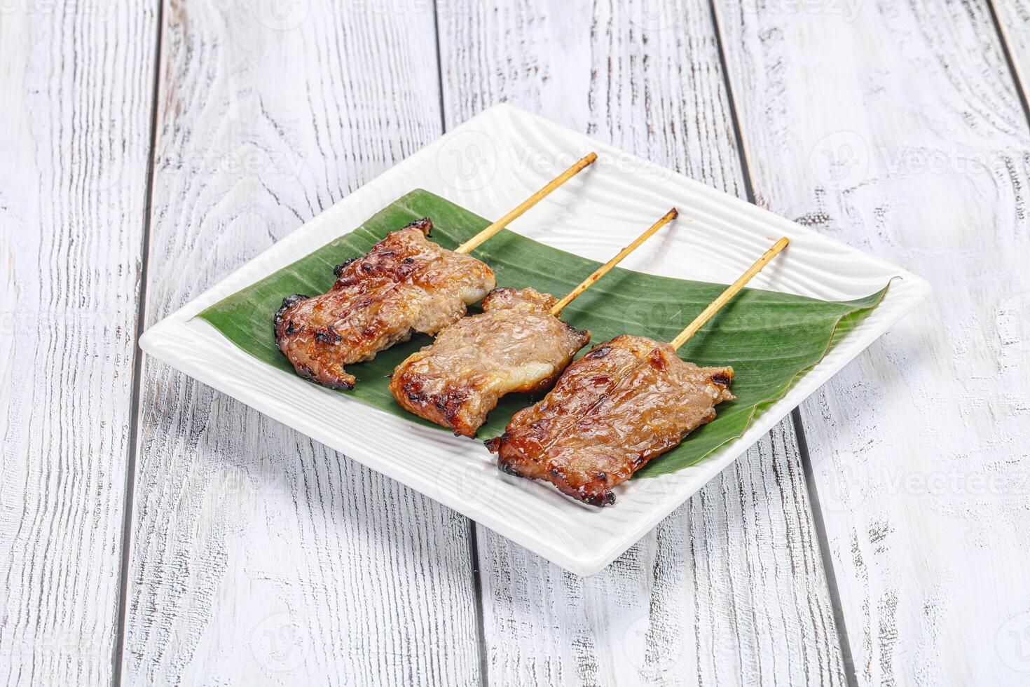 Thai cuisine - grilled pork skewer photo